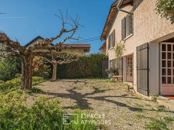Demeure à réinterpréter et son jardin bucolique
