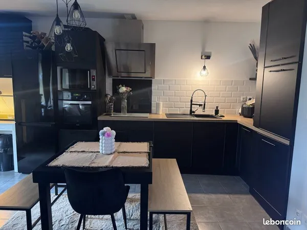 Appartement T3 de 56 m² avec terrasse, garage et parking sécurisé