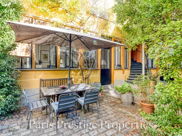 Jolie maison style atelier de 230m² avec 6 chambres et jardin, quartier Sainte-Marguerite 75011
