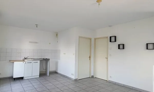 Appartement T2 RDC avec place de parking sécurisée