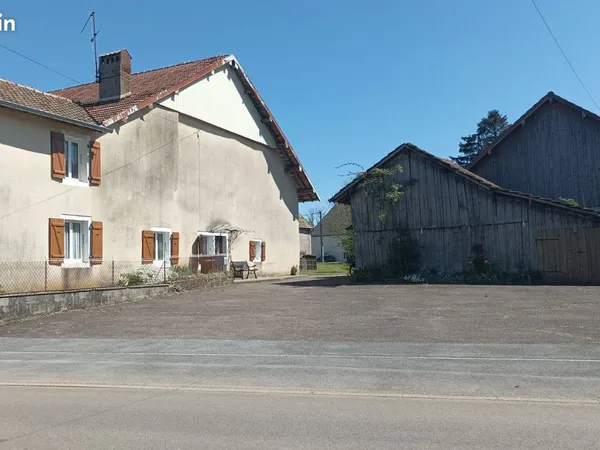 Propriété 2 maisons avec terrain