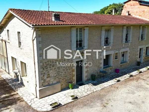 Ferme en pierre 6 pièces 218m² avec 2 hangars
