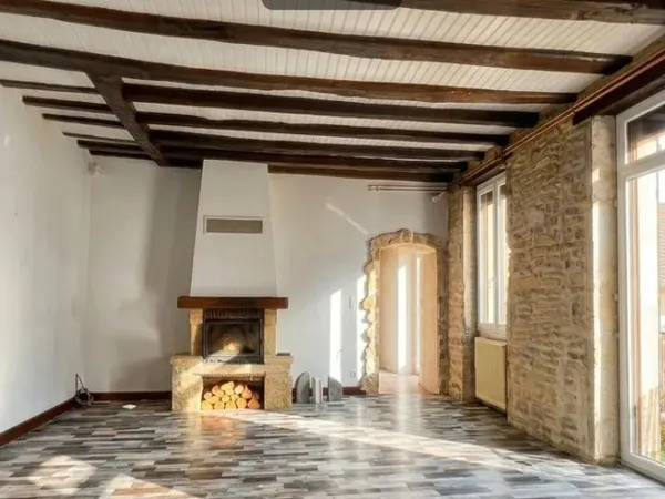 Vente Duplex poutres et pierres apparentes
