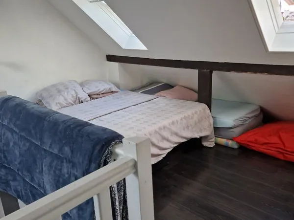 Chambre dans pavillon avec famille