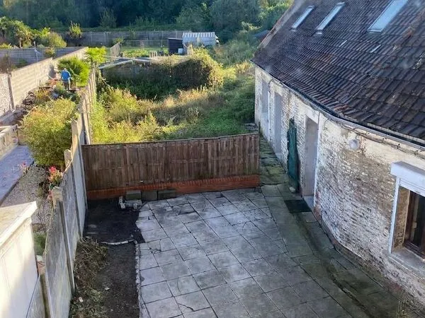 Studio 27 m² avec cour