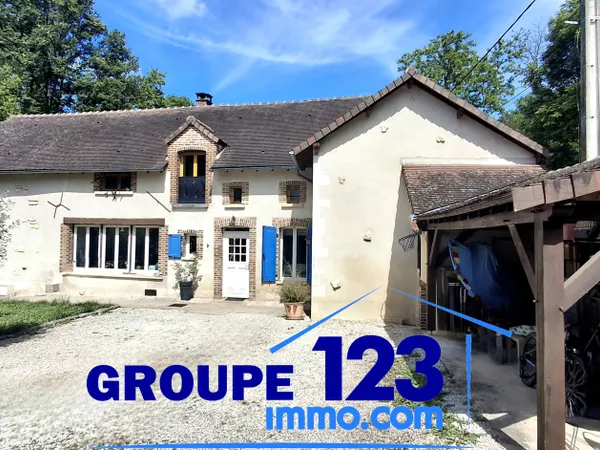 Maison de caractère bénéficiant d'un environnement verdoyant