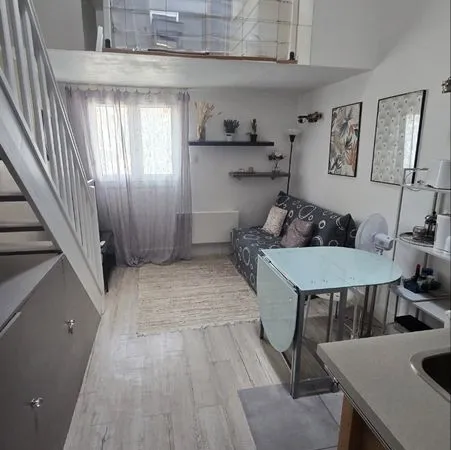​Idéal Investisseur : Studio avec mezzanine et parking, à 6 min de Disneyland et 2 min du RER