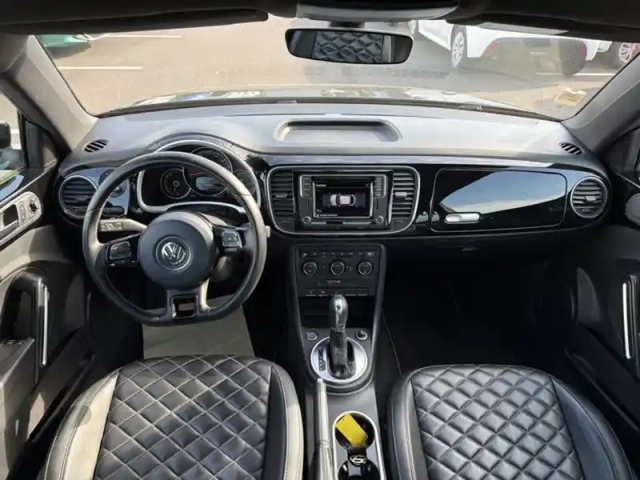 Volkswagen Coccinelle design bmt 1.2 105 ch dsg7 — photo 11