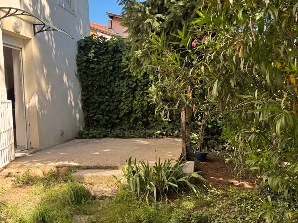 T3 avec jardin et grand garage