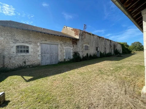 Bien Patrimonial avec terrain constructible