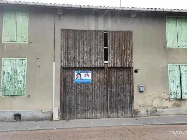 Ancien corps de ferme .
