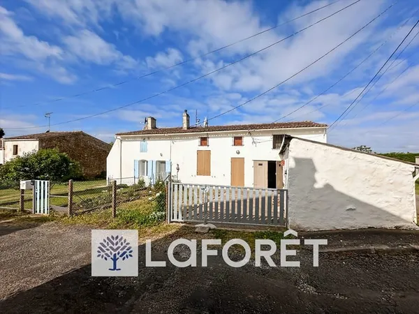Ensemble immobilier composé de deux maisons, dépendances et terrain clos de 2500 m² environ à GEMOZA