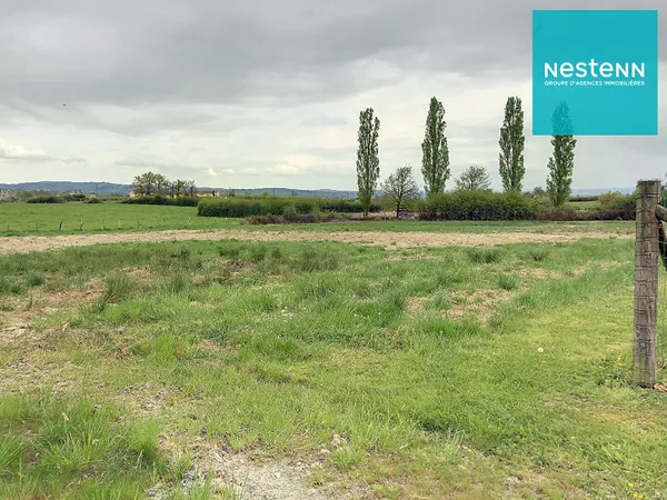15 minutes de Feurs, 10 min accès autoroute, terrain constructible à Saint-georges-de-baroille de 12