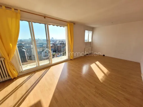 Appartement F4, ascenseur, cave, garage, balcon et terrasse