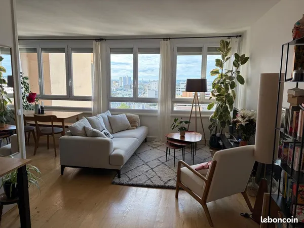 Appartement 51m² lumineux métro Crimée 19ème étage