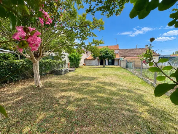 Maison de ville avec jardin - 105 m² - Beau potentiel