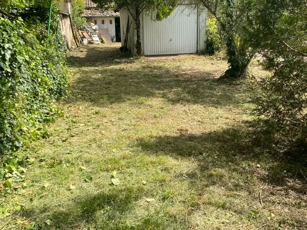 Garage plus terrain constructible