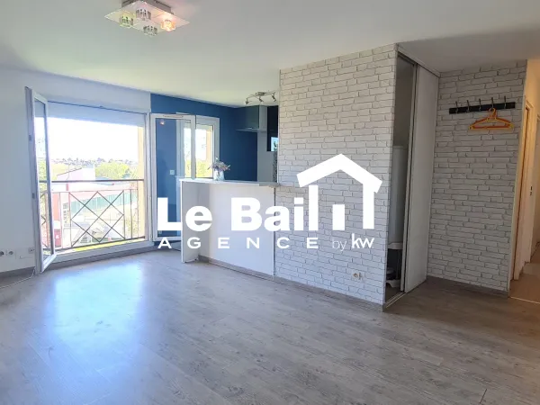 Appartement de 3 pièces en centre ville avec 2 parking + cave