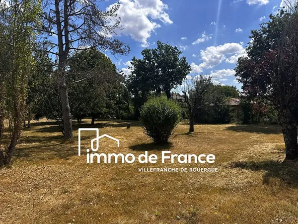Villefranche De Rouergue, terrain à bâtir de 1877 m² plat et arboré, quartier calme