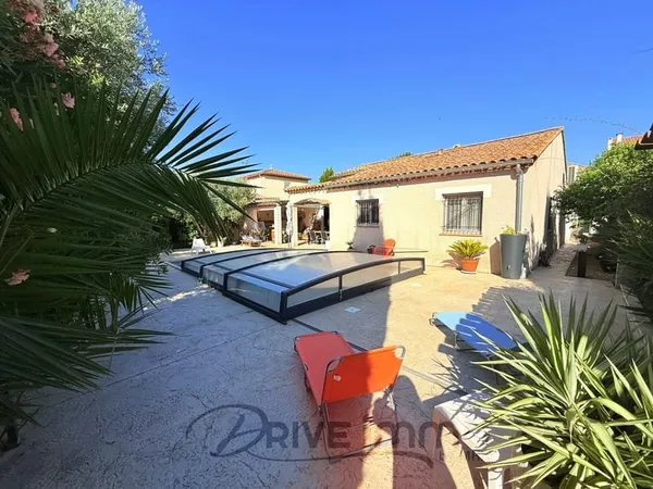 DRIVE IMMO NISSAN-LEZ-ENSERUNE... VILLA 200M2 PLAIN PIED POS