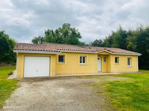 Maison avec jardin et garage à louer