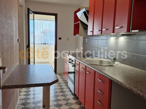Appartement T3 de 57 m2 avec véranda, garage et cellier.