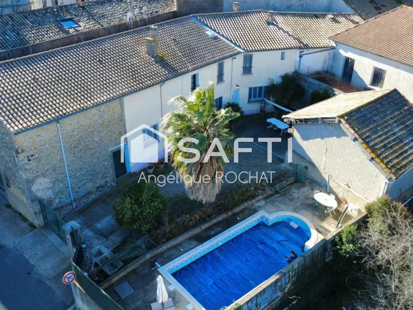 Grande bâtisse + 500m2 garage 190m2 + grenier 150m2 au centre de Magalas