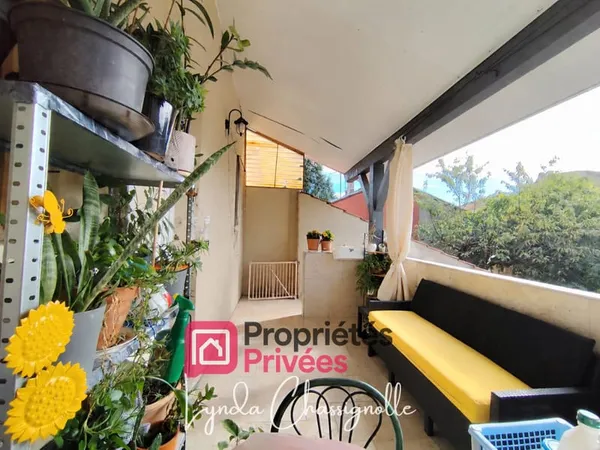 Immeuble composé de deux appartements et d'une maison de ville