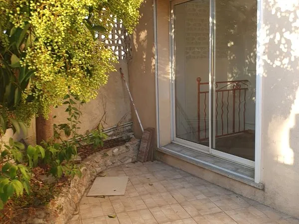 Appartement traversant rez-de-chaussée