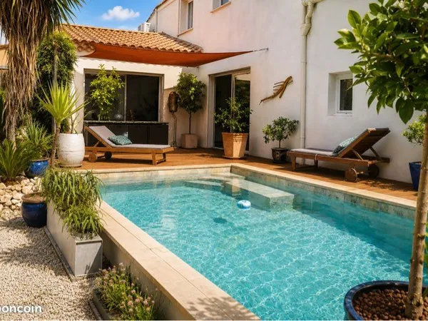 Maison de village de 160 m2 en plein coeur de Bassan avec son jardin et sa magnifique piscine Bali