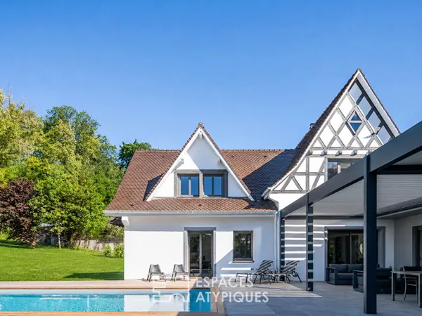 Propriété de caractère avec extension contemporaine et piscine