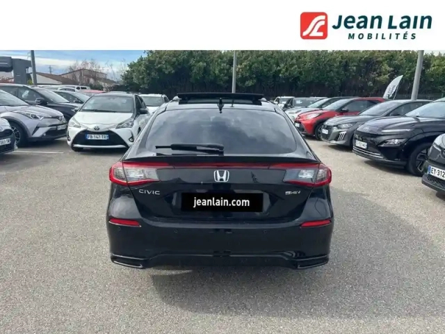 Honda Civic "e":hev 2.0 i-mmd — photo 24
