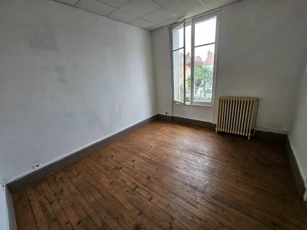 Appartement F3 56 m² quartier République proche Grand Marché avec petit jardinet