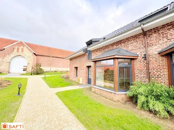 Location Saultain / BIEN D'EXCEPTION - MAISON SEMI - INDIVIDUELLE DE PLAIN-PIED AU CŒUR D'UN JARIN P
