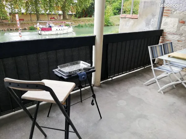 T2 meublé entièrement rénové- 42m2 - Terrasse avec vue canal ou l'art de vivre sans télé