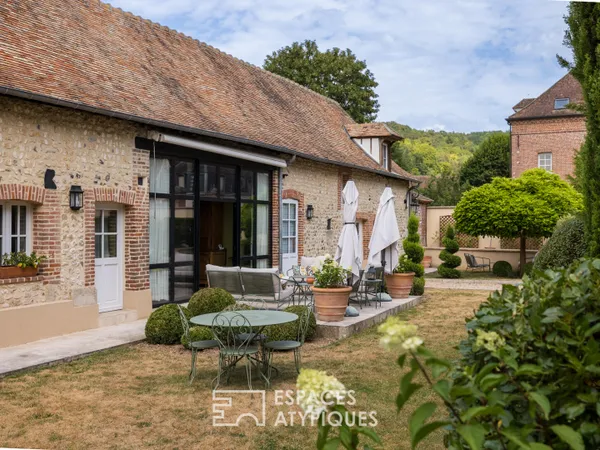 Ancien moulin à blé converti en atelier et maison rénovée