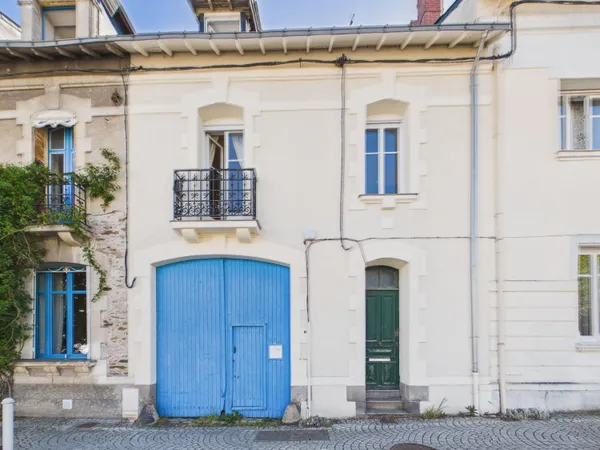 Vends maison divisée en 2 T2 - 90m²