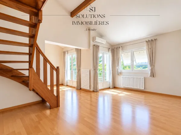 Appartement spacieux avec balcon, garage et cave