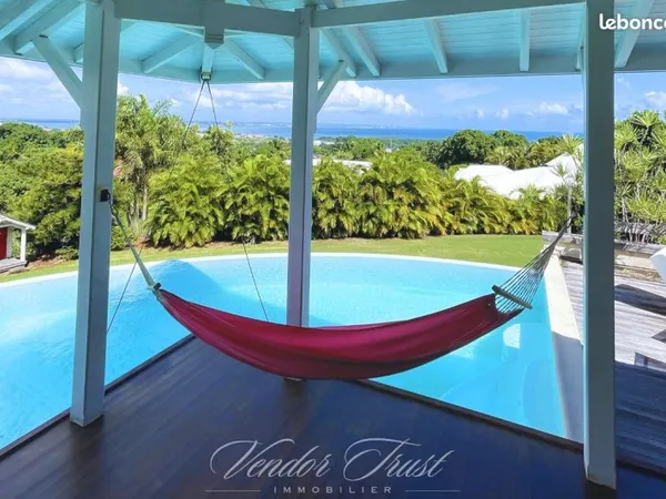Villa vue mer panoramique - piscine à débordement - dépendance - petit-bourg