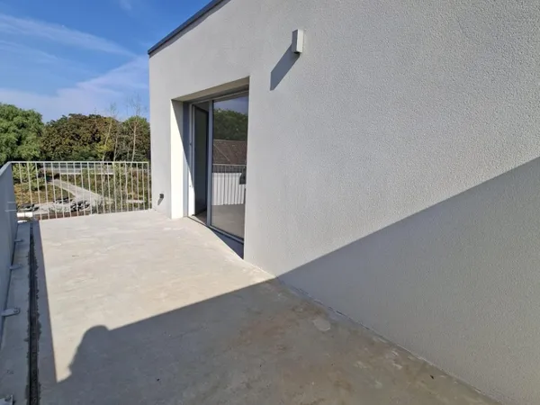 T4 neuf avec grand balcon et parkings
