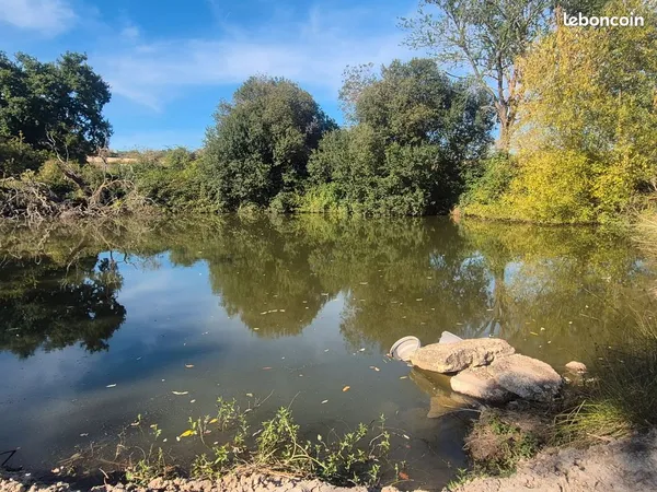Etang sur 16000m2 de terrain clos arboré premihat