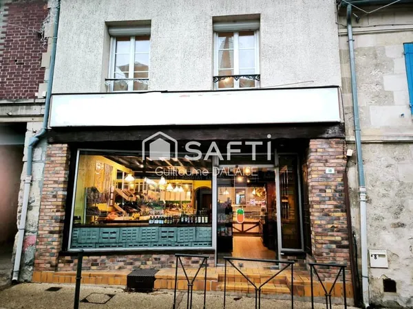 Fond de commerce et murs (magasin + appartement)