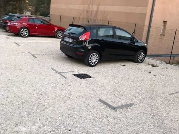 Place de parking en centre-ville à louer
