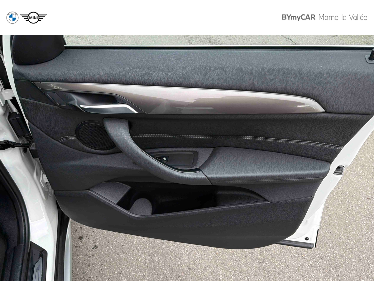 BMW X1 sDrive 18i 140 ch DKG7 — photo 28