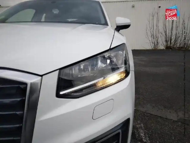 Audi Q2 1.6 tdi 116ch design s tronic 7 gps sans palette au volant — photo 13