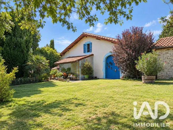 Maison 10 pièces 323 m²