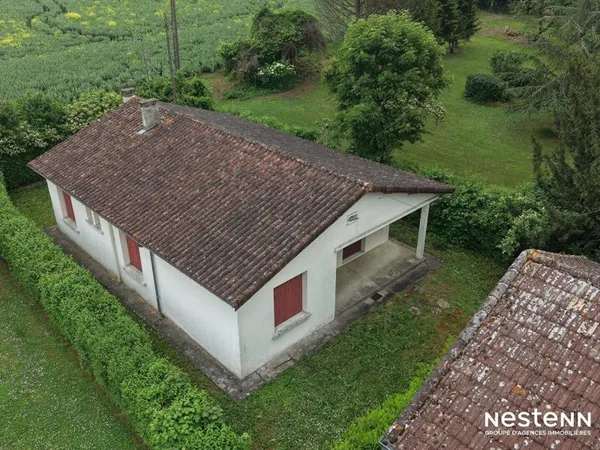 A Vendre Maison de plain-pied de 100 m² avec dépendance et jardin sur la commune de Mézin