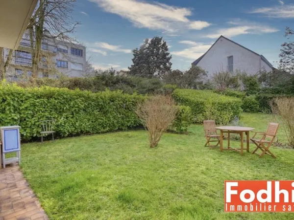 Centre ville- Appartement 3 pièces 71 m² avec terrasse et jardin privatif.