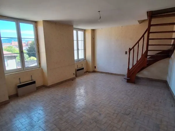 Appartement F3 beau potentiel