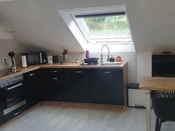 Belle appartement dans petit collectif de 3 logements avec grand garage et place de parking